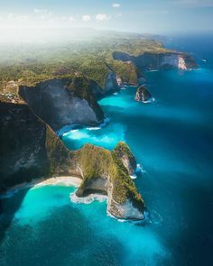 an aerial view of the blue waters and cliffs in the tropical island nation of zambaga, brazil