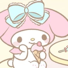 a cute little bunny eating an ice cream cone with a bow on her head in front of a cake