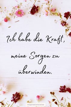 the words are written in german on a white background with pink and red flowers around it