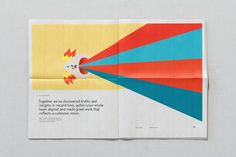 an open magazine with a colorful design on it