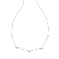 Timeless, dainty, and with the perfect touch of sparkle, the Iris White Strand Necklace has it all. Featuring petite crystals and miniature iterations of the iconic Kendra Scott medallion, this necklace will become your next go-to style. Designer, founder, and philanthropist Kendra Scott started her company in 2002, just three months after her first son was born. Her commitment to innovation, quality, customer service, and detail has taken her from a small startup to a billion-dollar brand. Kend Elegant Silver Charm Necklace With Diamond Accents, Silver Diamond Charm Necklace With Delicate Chain, Elegant Silver Charm Necklaces With Diamond Accents, Dainty Silver Charm Necklace With Diamond Accents, Iris White, Kendra Scott Bracelet, Bold Statement Necklaces, Large Statement Earrings, Target Gifts