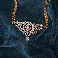 Description The Lydia Nakshatra CZ mini choker by Tarinika is a combination of sophistication and elegance. Made with Victorian-era-inspired plating adorned with best-quality Cubic Zirconia stones, this designer piece never fails to impress. Details & Specifications: Materials used: Brass Alloy with Antique Plating Weight – 24.33 gm Length – 8 cm, 25 cm adjustable chain Make it custom Want to make it a custom choker? Sure! Reach out to us at support@tarinika.com and we’ll be happy to make possib Elegant Hand Set Choker For Ceremonial Use, Elegant Hand Set Choker For Ceremonial Occasions, Elegant Ceremonial Hand Set Choker, Elegant Stone Work Choker Necklace, Intricate Design Choker Necklace For Reception, Elegant Stone Work Choker For Diwali, Elegant Choker With Intricate Design For Reception, Elegant Choker Necklace For Diwali, Elegant Jeweled Choker For Festivals