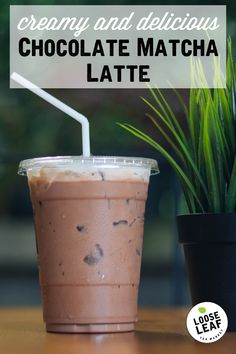 chocolate matcha latte in a plastic cup next to a potted plant with the words creamy and delicious chocolate matcha latte