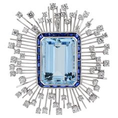 This brooch is designed with aquamarine stone in the center with the total carat weight of 35.03 accented with sapphire with the carat weight of 3.70 and diamonds with the total carat weight of 3.55. Sophia D by Joseph Dardashti LTD has been known worldwide for 35 years and are inspired by classic Art Deco design that merges with modern manufacturing techniques. Aquamarine Stone, Art Deco Design, Classic Art, Aquamarine, Brooches, Platinum, Sapphire, Art Deco, Diamonds