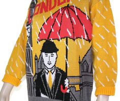 "This 80s-era novelty sweater features incredible yellow pop art graphics of London England, including Big Ben and a dapper gentlemen on a rainy day. Sweater is unlined, pullover style. Fits size small, medium, or large, depending on desired fit (please check measurements below). Accessories not included. Payment plans available. Approximate Flat Measurements: Multiply times 2 for bust, waist, and hip measurements. For best fit, compare with a similar style of clothing which you already own. Tot Fitted Graphic Print Sweater For Spring, Retro Spring Sweater For Streetwear, Retro Turtleneck Sweater For Spring, Vintage Fitted Sweater For Streetwear, Spring Retro Turtleneck Sweater, Retro Graphic Print Sweater For Fall, Fun Graphic Print Winter Sweater, Fun Winter Sweater With Graphic Print, Yellow Winter Sweater For Streetwear