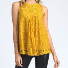 Sunflower Yellow Lace Top. Doe & Rae Sleeveless Blouse. Lace Overlay With Pleated Bust. Scalloped Decorative Trim. Rounded Neck. Rear Upper Keyhole With Button. Swing Silhouette. Nwt Never Worn, No Flaws. Size Small Approximate Measurements... Pit To Pit Lying Flat: 17” Length: 24” Easter Spring Summer Sunshine Career Casual Cute Yellow Lace Top Spring Lace Sleeveless Tank Top, Chic Sleeveless Lace Tank Top, Sleeveless Lace Tank Top For Spring, Lace Sleeveless Vest Top, Elegant Yellow Sleeveless Blouse, Elegant Sleeveless Yellow Blouse, Yellow Lace Tops For Summer, Lace Sleeveless Tank Top For Day Out, Sleeveless Lace Blouse For Summer