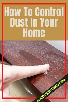 a hand pointing at the top of a wooden table with text overlay that reads how to control dust in your home