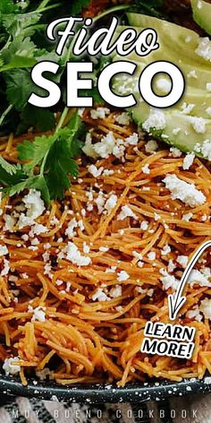 a bowl filled with shredded cheese and garnished with cilantro on top