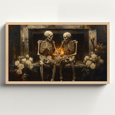 two skeletons sitting next to each other in front of a fireplace with candles and flowers