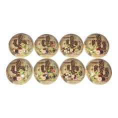 six glass knobs with an image of a giraffe and flowers on them