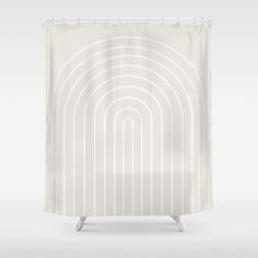 a shower curtain with white lines on the outside and inside, in front of a gray background