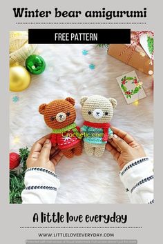 two crocheted teddy bears sitting next to each other in front of christmas decorations