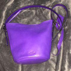 Good Condition (Shows Some Sign Of Use). Love This Bag But Have To Pass It Along. This Bag Is Called The Bleecker Mini Duffle. Designer Coach Bag In Purple, Designer Coach Bucket Shoulder Bag, Purple Bucket Shoulder Bag With Detachable Strap, Purple Bucket Bag With Adjustable Strap, Purple Crossbody Bucket Bag With Adjustable Strap, Chic Purple Bucket Shoulder Bag, Coach Bucket Shoulder Bag For Evening, Bags Purple, Purple Vintage