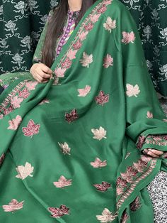 Green multicoloured kashmiri pashmina shawl is a statement piece with your winter outfits. Pure wool shawl. Embroidered kashmiri pashmina shawl. Beautiful winter accessory to pair with your statement dresses. Soft and warm beautiful winter shawl. Buy this for your self or give it to the ones you love ❤️  Length: 93 inches Width: 44.5 inches This item is dry clean only. Delivery 1-3 working days to UK 3-5 working days to Europe  And 6-7 working days to US and Other countries. Traditional Embroidered Green Shawl, Green Embroidered Shawl For Festivals, Green Traditional Pashmina Shawl, Green Pashmina Shawl For Wedding, Green Bohemian Jamawar Dupatta, Traditional Green Scarves For Festive Season, Festive Green Shawl, Traditional Green Pashmina Shawl Dupatta, Traditional Green Pashmina Dupatta Shawl