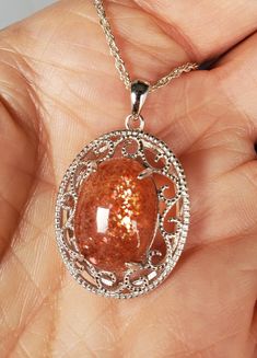 "Sparkling, Shimmering Natural Orange Schiller Sunstone Necklace. 12x16mm Stone, See Video! 925 Sterling Silver Rococo Pendant, 18\" Sterling Chain. Gift Box Included." Crystal Necklace Aesthetic, Sunstone Necklace, Witch Pendant, Oc Aesthetic, Orange Crystals, Rococo, Crystal Necklace, Supernatural, Gift Box