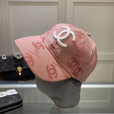 SHOP MORE LUXURY PRODUCTS HERE Description Chanel Cap Pink Chanel branded Cap with a dynamic and youthful design PinkPink FabricCC Logo Includes box, dust bag.This product is of the premium quality. Chanel Cap, Dior Shirt, Gucci Shirt, Louis Vuitton Shirt, Chanel Shirt, Branded Caps, Chanel Brand, Chanel Logo, Pink Chanel