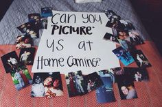 a bed topped with pictures and a sign that says can you picture us at home coming?