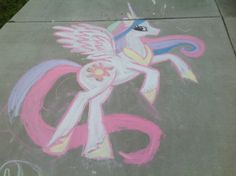 a chalk drawing of a pink pony with wings on it's back and tail