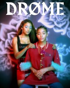 two young women sitting next to each other in front of a poster that says,'dromee '