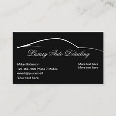 a black and white business card with an image of a car on the front side