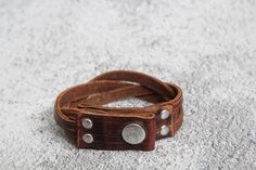 "Best Father's Day gift! Handmade, hand-braided leather bracelet. Great piece of men jewelry! Gift packaging! Super comfortable & easy to wear. Great, meaningful gift idea. ----- PERSONALIZATION: ------- Family name, special date, initials, coordinates can be engraved on the outside of the bracelet. If you want your date to be in Roman Numerals please mention that in the note to seller and provide the date in Roman numerals. ★Notice One line max 12 letters How to order MATCHING BRACELETS: Pl Handmade Leather Wrap Bracelet For Gift, Handmade Leather Wrap Bracelet Gift, Distressed Brown Leather Bracelets As Gift, Brown Leather Wrap Bracelet For Gift, Brown Leather Wrap Bracelet As Gift, Brown Leather Wrap Bracelet Gift, Rustic Jewelry With Leather Strap For Gift, Rustic Leather Strap Jewelry Gift, Brown Leather Strap Wrap Bracelet Gift