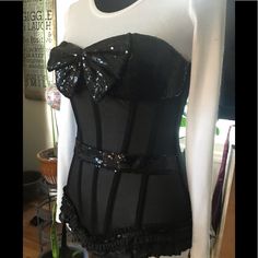 Black On Black Mesh Corset Top W Black Sparkle Belt Across Front. Black Sparkle Cups/Chest With Large Black Sparkle Bow. Black Sparkle Belting Across Front. Detailed Bottom Trim With Mesh Lace, Ribbon And Black Sparkle. Vertical Piping To Keep The Perfect Corset Shape, Throughout Bodice Front, Sides And Back. Attachments For Stockings- Front And Back. Adjustable Closures Up The Back (2 Different Rows Available); Never Been Worn; Nwot Perfect Valentine’s Gift! Valentine’s Day Outfit For The Hubby Black Sequined Corset For Night Out, Black Sequined Corset, Black Mesh Corset, Badass Outfit, Mesh Corset, Gift Valentine, Black Sparkle, Black On Black, Lace Ribbon