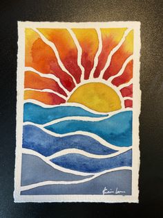 a watercolor painting of the sun and ocean