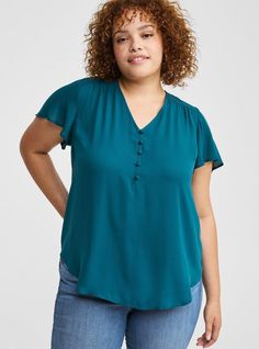 FIT Model is 5'10. 5” wearing size 1. . Measures 30” from shoulder (size 2). Pullover design. . MATERIALS + CARE Georgette woven fabric: Long-lasting, breathable, slightly sheer and super low-maintenance-what more could you ask for in a fabric?. Stretch level: Minimum. 100% polyester. Machine wash cold. Dry low. Imported. DETAILS Collarless neckline. Short flutter sleeves. Button detail at bust. . The best plus size women's harper georgette pullover flutter sleeve blouse the in deep teal made of Stretch Flutter Sleeve Tops For Work, Workwear Flutter Sleeve Stretch Top, Blue Flutter Sleeve Blouse For Work, Blue Flutter Sleeve Tops For Work, Blue Flutter Sleeve Tops For Workwear, Blouse Images, Flutter Sleeve Blouse, Disney Leggings, Floral Pullover