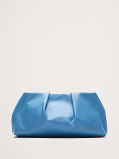 We designed this cloud-shaped clutch to carry you through every occasion for years to come, crafted here from beautiful leather to emphasize a distinctive pleated construction.  Magnetic clasp closure.  Fully lined.  Height: 6. 3" Width (base): 12. 8" Width (top): 10. 5" Depth: 2. 75" Woolen Tights, Dressy Hats, T Bar Shoes, Burgundy Style, Chic Fall Outfits, Black Pantyhose, Faux Leather Belts, Family Event, Leather Clutch Bags