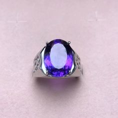 "Product description: Product Type - Ring Metal Type - 925 Sterling Silver (High Quality Polishing & Finishing) Gemstone - Natural Amethyst Gemstone Size - 12X10 MM Gemstones Shape - Oval Accent Stone - None Gemstone color - As Picture Gemstone Purity - 100% Natural (Guaranteed) Standard Shipping - 3 to 7 Days ($25 Extra) Economy Shipping - 10 to 20 Days (Free Worldwide) Please Note - Color in the picture may be slightly different from the actual product. Due to photographic light conditions Purple Gemstone Signet Ring For Anniversary, Luxury Purple Sterling Silver Ring, Amethyst Gemstone Signet Ring For Anniversary, Amethyst Signet Ring With Gemstone For Anniversary, Classic Purple Signet Ring For Anniversary, Silver Amethyst Gemstone Signet Ring, Silver Amethyst Signet Ring With Gemstone, Silver Luxury Amethyst Ring With Polished Finish, Purple Rings With Polished Finish For Anniversary