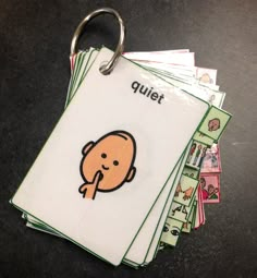 a clipboard with an image of a baby's head on it and the words quiet