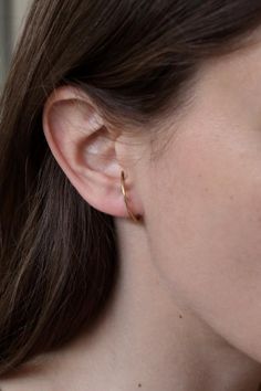 Minimal pair of earrings from " reflection " collection.An everyday wear pair of delicate sterling silver hoops  for pierced ears only.You may nee to adjust them a bit cause every ear is different Available in sterling silver and gold plated silver.This listing is for the silver hoops and not for the double gemstone earring , you will find our "marco" earrings here :https://www.etsy.com/listing/552590333/marco-925-st-silver-earrings?ref=shop_home_active_75This item is made to order ,and it may t Everyday Pierced Ear Cuff, Minimalist 14k Gold Huggie Ear Climbers, Minimalist 14k Gold Hypoallergenic Ear Climbers, Minimalist Ear Climbers For Gift, Classic Everyday Hypoallergenic Ear Climbers, Minimalist 14k Gold Single Ear Climber, Minimalist Hypoallergenic Yellow Gold Ear Climbers, Classic Everyday Ear Climbers With Matching Earrings, Minimalist Gold Huggie Ear Climbers