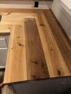 a kitchen counter top made out of wood