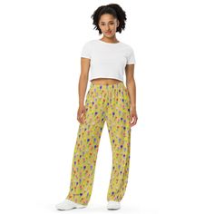 Upgrade your loungewear with our All-Over-Print Unisex Wide-Leg Pants, designed for ultimate comfort and style. These best-selling pants effortlessly blend fashion with function, making them perfect for everything from cozy pajamas to trendy streetwear. Whether you're lounging at home or stepping out, their super soft, stretchy fabric ensures comfort in every move. Crafted with premium knit mid-weight jersey fabric, these pants feature a relaxed unisex fit and an adjustable elastic waistband with a white drawstring for added comfort. Plus, the practical side pockets make them ideal for daily wear. Choose to wear them on the waist or hips for a customizable fit. The fabric's OEKO-TEX 100 standard certification guarantees safe, eco-friendly material that's gentle on the skin. Whether you're Comfy Lounge Pants, Pants Comfy, Comfy Lounge, Cozy Pajamas, Trendy Streetwear, Pj Pants, Pants With Pockets, Pantalon Large, Flowers Pattern