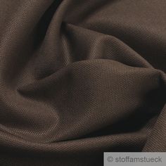 a close up view of a brown fabric