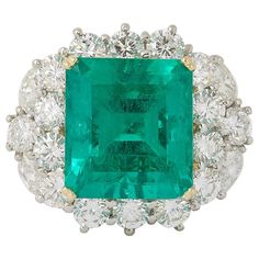 A DIVINE Emerald!! 11.05 GIA certified Colombian Emerald cut Emerald 4.62 carats of white round brilliant cut and marquise cut diamonds. Platinum and 18k yellow gold. size 6.75, this ring can easily be resized. 21.1 mm x 24.13 mm approximately 7 Carat Diamond Ring, Antique Emerald Engagement Ring, Emerald Statement Ring, Antique Emerald Ring, Yellow Gold Cocktail Ring, Emerald Ring Vintage, Emerald Rings, Marquise Shape Diamond, Emerald And Diamond Ring