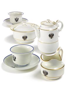 an assortment of porcelain dishes and cups