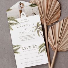 an image of a wedding card and fan