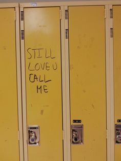 some yellow lockers with graffiti written on them and the words still love u call me