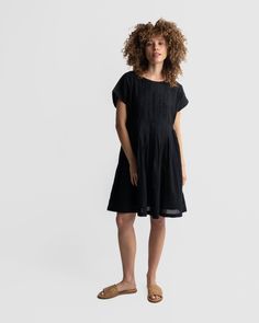 This classic dress features intentional front pleats and side gathers for a relaxed fit, perfect for warm weather. It is fully lined, making it a versatile option that can be dressed up or down with boots or flats. Relaxed fit Falls 36" from the high point of the shoulder Made with Hand-woven cotton Lined Pocket Sustainably made Machine wash Fabric feels soft, sheer and light Meet Mr. Safik, the maker of this dress The Maker, Classic Dress, Mens Accessories Fashion, High Point, Shirt Skirt, New Arrival Dress, Woven Cotton, Stunning Dresses, Xl Dress