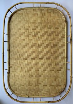 a bamboo tray is shown on the wall