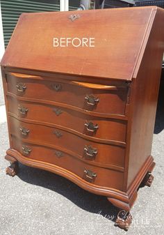 an old wooden dresser with the words before painted on it's top and bottom