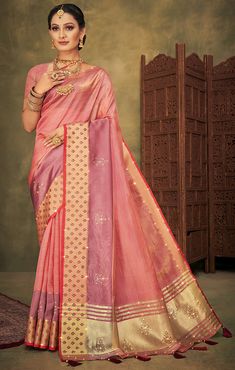 This Saree is Ready to Wear (With Fall and Pico Done). A designer saree in Pink color. It has intricate design all over the saree. This saree is a suitable amalgamation of style and grace that is required from an ethnic wear. The saree is ideal for any formal gathering. The saree comes with an unstitched blouse of corresponding color and design as shown in the picture. Silk Designer Pink Color Saree Fabric Type: SilkPrimary Color: PinkSecondary Color(s): -GoldenSaree Length: 6.0 meters including Pink Color Saree, Indo Western Gown, Sequence Blouse, Saree Petticoat, Kurta Pajama Men, Full Sleeve Blouse, Saree Jewellery, Belt Blouse, Lehenga Skirt