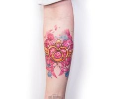 a person with a tattoo on their arm