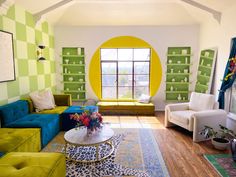 a living room with green and yellow walls