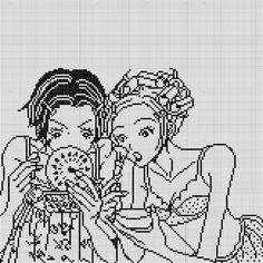 two women sitting next to each other in front of a cross stitch pattern