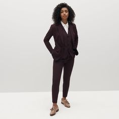 This burgundy pantsuit is about to become your wardrobe’s biggest power player. Perfect for your next big event, our deep wine shade is sure to turn heads. Created with our upgraded stretch-fit fabric, this dark, subdued red stunner maximizes comfort along with sleek style. Tuxedo Women Suits In Wine Or Burgandy, Maroon Womens Suit, Wine Red Suit Women, Suits For Women Wedding Guest, Women Groomsmen Outfits, Wedding Suit Women Tomboys, Formal Suits For Women Prom, Tomboy Wedding Outfit Guest, Burgundy Pantsuit