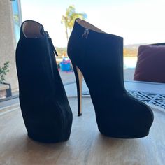 Size 37.5 Black Suede High Heel Bootie . Like New Elegant Ankle-high Suede Heels, Elegant Platform Ankle Boot Heels, Suede Heels For Cocktail Occasions, Cocktail Suede Heels, Platform Heels Ankle Boot For Evening, Evening Platform Ankle Boot Heels, Evening Suede Platform Boots, Platform Heels With Round Toe For Cocktail, Round Toe Platform Heels For Cocktail