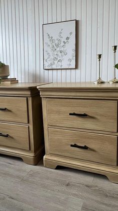 two wooden dressers sitting next to each other