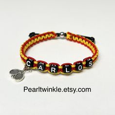 This sports bracelet is carefully and beautifully handcrafted to give an accent to your sporty look. Using durable and high quality materials, this bracelet is meant to charm and last with proper care.  Width of the band is 1/4 inch.  Please select your bracelet size, and closure option. If you want other colors, please specify it in the personalization box. Have another name in mind? Or colors? Just send me a message and let's  make something just for you! NOT SURE OF THE SIZE FOR YOUR BRACELET Printable Ruler, Fan Bracelet, Baseball Bracelet, Carlos Alcaraz, Tennis Fan, Bracelet Tennis, Tennis Gifts, Sports Bracelet, Name Bracelet